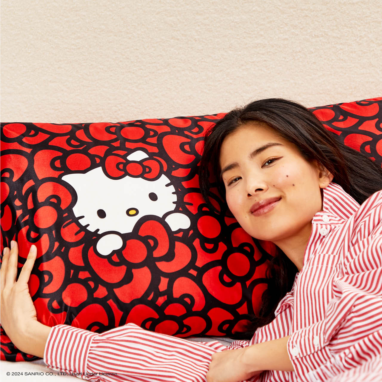⭐ Top Rated | Kitsch x Hello Kitty Satin Pillowcase in Kitty Bathes in a Sea of Bows - 60% Off - Image 3